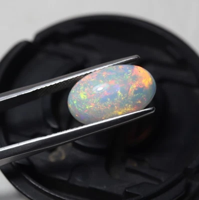 4.5 Cts 15.7x9.5 MM Natural AAA Flashy Multi Fire Ethiopian Opal Oval Cabochon - Image 1 of 4