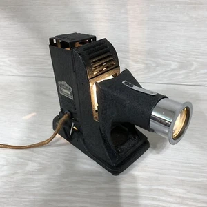 Proiettore miniatura RK SVE vintage anni '40 con obiettivo regolabile, funzionante - Foto 1 di 17