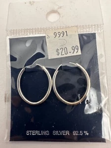 Pendientes de aro ovalados de plata de ley .925 de 3/4" x 1" - Imagen 1 de 8