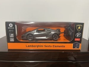 Radiocomando radiocomandato Braha Lamborghini Sesto Elemento rosso 1:24 argento chiaro - Foto 1 di 2
