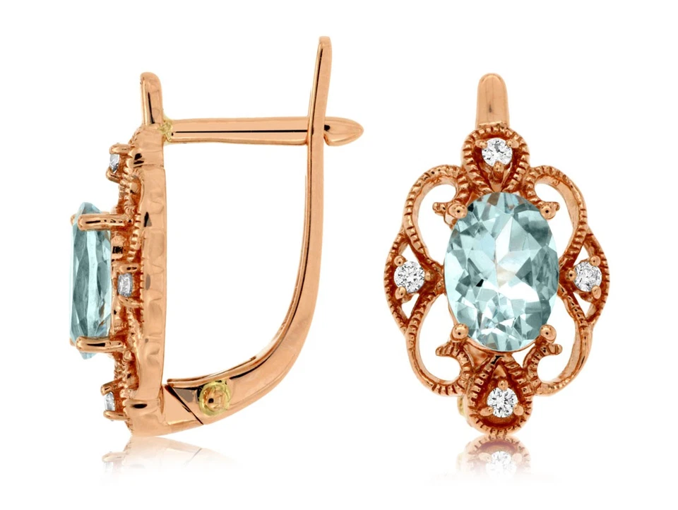 Pendientes de oro rosa de 14k con piedras aguamarina de corte ovalado, 3,3 g Foto 1 de 1