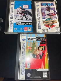 Sega Saturn Lot of 3 w/World Series Baseball II, Theme Park and NHL Powerplay 96