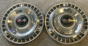 Two Vintage Chevy Impala Cross Checkered Flag Hubcaps 14" Chevrolet - Picture 1 of 13