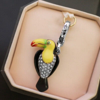 NUEVO CON ETIQUETAS NUEVO EN CAJA JUICY COUTURE Tucán Pavé Cristal Tropical Pájaro Pulsera Dije NUEVO  Foto 1 de 4