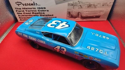 RICHARD PETTY #43 FORD TORINO COBRA 1/24 AUTOGRAPHED - Image 1 of 3