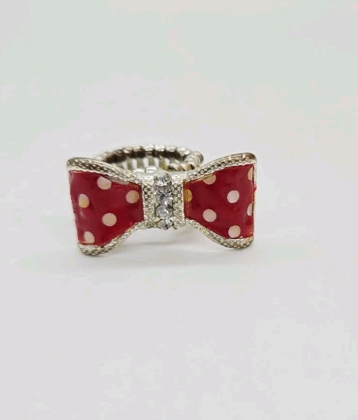 Anillo elástico con lazo de lunares tono plata ed esmalte blanco OSFM talla única Foto 1 de 4