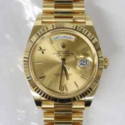 Reloj automático Rolex Day-Date 40 228238 oro amarillo champán esfera romana Foto 1 de 4