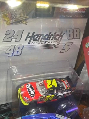 ••NEW IN PACKAGE••2010 JEFF GORDON #24 DuPONT MONSTER TRUCK IMPALA (1:64 Scale) - Image 1 of 4