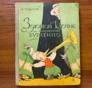 BURATINO Pinocchio Chiave Dorata Fiaba Bambino Illustrato Kanevsky Libro Russo - Foto 1 di 12