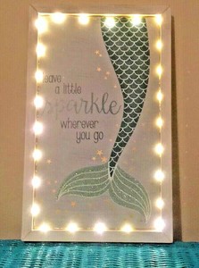 New mermaid wall art lights up! A Must Have For Nautical Fans. Easy To Use