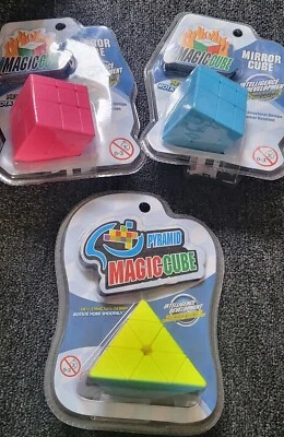 3 PACK - MAGIC CUBE 1 PINK, 1 BLUE, 1 PIRAMID MULTICOLOR CUBE 2.5X 2.5 inch - Image 1 of 4