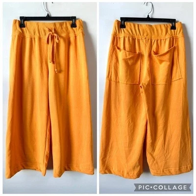 Pantalones de rizo Free People Beach recortados pierna ancha naranja S Foto 1 de 4