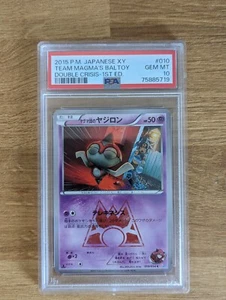 Tarjeta Pokémon japonesa Team Magma's Baltoy PSA 10 010/034 XY Double Crisis 1st ED - Imagen 1 de 2
