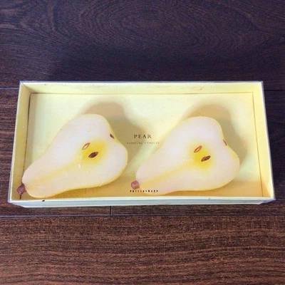 Velas flotantes Pottery Barn par de peras cera amarilla 5 horas de combustión Foto 1 de 4
