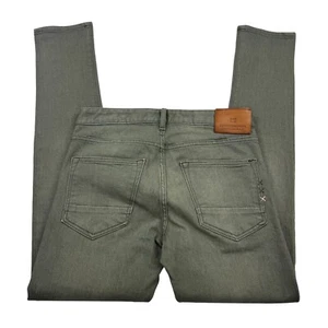 Jeans Scotch & Soda Skim uomo 29x32 verde denim slim fit piatto davanti gamba dritta - Foto 1 di 9