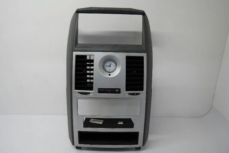 CHRYSLER TOWN & COUNTRY 2008-2010 RADIO CENTRAL DELANTERA BISEL DE AJUSTE CLIMÁTICO OEM Foto 1 de 4