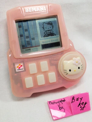 Hello Kitty Bemani Beat Mania Llavero Portátil LCD Juego Cara Música Danza Konami Foto 1 de 4