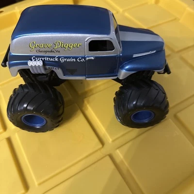 GRAVE EXCAGGER Currituck Grain Co - Vehículo de Metal 1:24 Monster Jam Camión SERIE 22 Foto 1 de 4