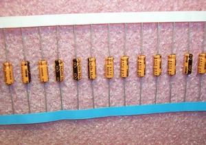 QTY (50) 33uf 25V 85' AXIAL ELECTROLYTIC CAPACITORS 516D336M025JL7B SPRAGUE - Picture 1 of 2