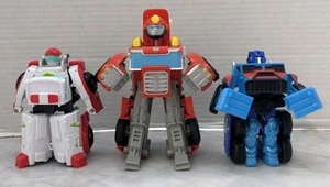 Playskool Heroes Transformers Rescue Bots Optimus Prime , Heatwave & Docbot - Picture 1 of 9
