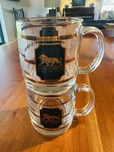 Paar MGM Grand Las Vegas Durchbruch Glas Souvenir Tassen MCM Bar Schwarz & Gold - Bild 1 von 12