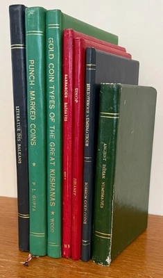 Lot of 7 leatherbound works on World coins - Image 1 of 4