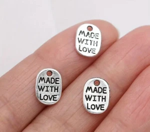 30 piezas Retro Plata "HECHO CON AMOR" Etiqueta Ovalada Dije Aleación Colgante Artesanal 11*8mm - Imagen 1 de 3