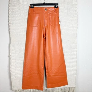 ANTHROPOLOGIE Maeve Naranja Brillante Colette Imitación Cuero Recortar Pierna Ancha Pantalones NUEVO - Imagen 1 de 7