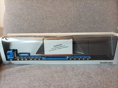 Herpa H0 1:87 in OVP - 265683  MAN TGA Schwerlast-Sattelzug + Ladung "Goldhofer" - Bild 1 von 4