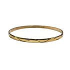 9ct 9k Yellow Gold Wave Pattern Round Bangle 63mm x 3.9mm 8.46 Grams. Brand New