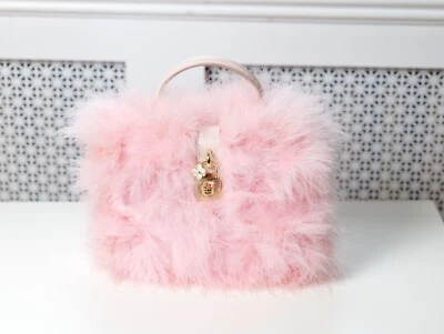 Bolso clutch Dolce & Gabbana rosa mullido pluma de marabú cierre dorado PVP €3.875 Foto 1 de 4