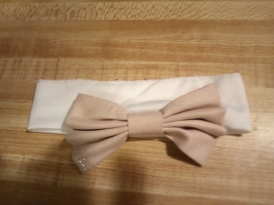 Diadema con lazo brillante dorado marfil poliéster 0-6 meses bebé niña sin marca Foto 1 de 1