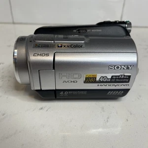 Sony HandyCam HDR-SR5 HDD Videocamera 80X Zoom + Night Shot FUNZIONANTE ma con DIFETTO *LEGGI - Foto 1 di 13