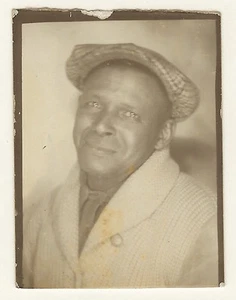 A PHOTO BOOTH PHOTOGRAPH OF A MIDDLE AGED AFRICAN AMERICAN MAN - Picture 1 of 2
