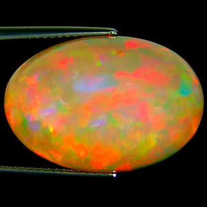 16,48 ct natürlicher äthiopischer Opal IGI zertifiziert gelbbraun oval Cabochonschliff - Bild 1 von 2
