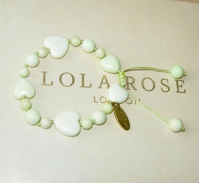 LOLA ROSE *LOVELY* PALE YELLOW OPAQUE WHITE ADJUSTABLE HEART TUMBLE BRACELET QVC - Image 1 of 2