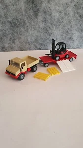 Carretilla elevadora siku 2522 Unimog 1620 beige U 1500 con Linde H 30 años 1:55 - 80 - Imagen 1 de 9