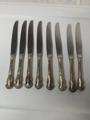 Juego de 8 cuchillos de cena de acero inoxidable National Silver Co. vintage 1951 patrón navideño Foto 1 de 3