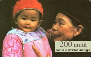 carte telefoniche - New Extradialoga - Anziana e bimba asiatica -italia -200 U I - Picture 1 of 1