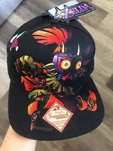 Mütze Kappe Legend of Zelda Majora's Mask Druckknopflasche neu mit Etikett! SELTEN! Nintendo Mütze Druckknopflasche - Bild 1 von 7