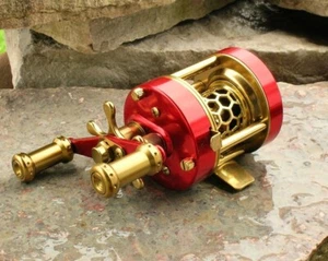 Carrete de fundición de cebo redondo - rojo - 10 lb - 120 yd - Imagen 1 de 3