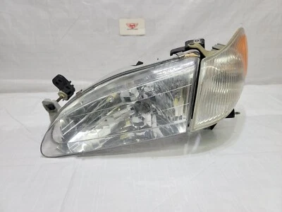 Faro delantero izquierdo Toyota Corolla 1993-1997 OEM 811501A490 Foto 1 de 4