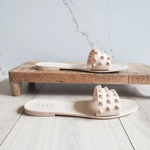 Sandali Nicole Miller Quamtie con borchie slide donna 7 scarpe basse nude beige gelatina - Foto 1 di 7
