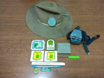 VINTAGE FORESTRY PATCHES PINS STICKERS LOT DUST MASK  FILTERS & TEXAN HAT 7 1/4 - Image 1 of 4