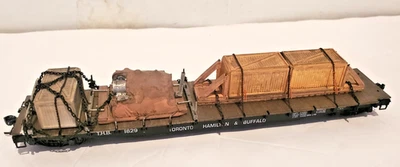 Custom HO scale Flat car with Various Industrial Equipment Chained load - Image 1 of 4