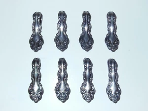 Vintage 8-piece Oneida Beethoven Silver Plate Stainless Steel Napkin Ring/Clip - Picture 1 of 5