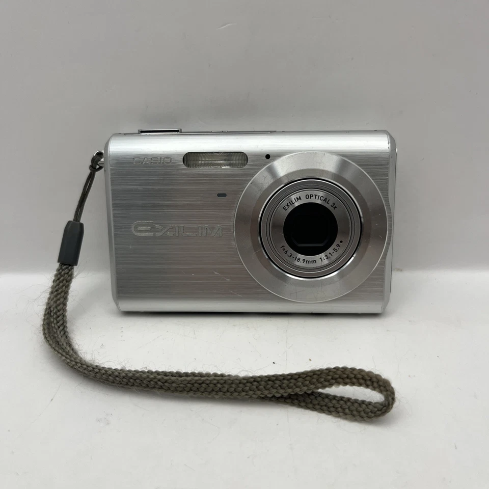 Casio Exilim EX-Z60 6.0MP Digital Camera Silver – Fully Working with Strap - Image 1 of 4
