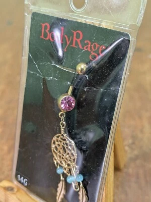 Anillo para el vientre Spencer's Body Rage Dream Catcher piedra rosa Foto 1 de 4