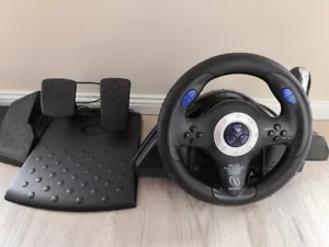 InterAct Blue Thunder Racing Wheel-PS1 / PS2/ PlayStation / Lenkrad Mit Pedalen - Bild 1 von 7
