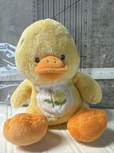 Sonajero de pato de felpa Woody Toys con flores - Imagen 1 de 5